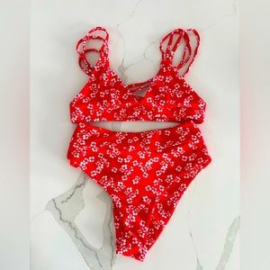 Brand new. Unworn. Kulani Kinis bikini bottoms and two tops. NWT.